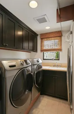 a kitchen with a washing machine and a sink at Poinsettia Palms - Chic & Luxe Patio Near Beach in Corona del Mar