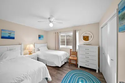 a bedroom with two beds and a window at Ruby Villa A - Stay for 6 in Newport Beach