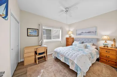 a bedroom with a bed and a desk at Ruby Villa B - Upper Unit for 6 in Newport Beach
