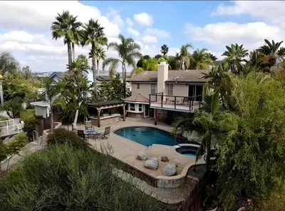an aerial view of a house with a swimming pool at Serene hillside oasis with pool - 20 min to beach in Oceanside