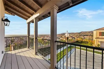 a balcony with a view of a city at Hidden Gem New 4B3B House UCI Disney Amazing view in Irvine
