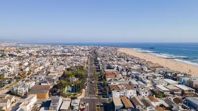 an aerial view of a city and the beach at Steps from the SandBoardwalk Outdoor Dining Parking and Patio in Newport in Newport Beach