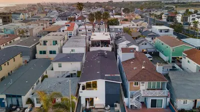 an aerial view of a town with houses at Steps from the SandBoardwalk Outdoor Dining Parking and Patio in Newport in Newport Beach