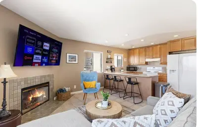 a living room with a couch and a fireplace at Hidden Gem 3Bed 3Ba Retreat Jacuzzi AC Balconies in San Diego
