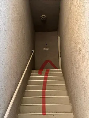 a stairway with a red line on the stairs at Hidden Gem 3Bed 3Ba Retreat Jacuzzi AC Balconies in San Diego