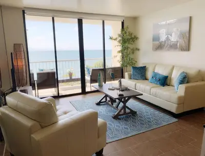 a living room with two couches and a table and a couch at Sunset Cliffs Oceanfront Oasis, San Diego - Stunning Views & Ocean Sounds in San Diego