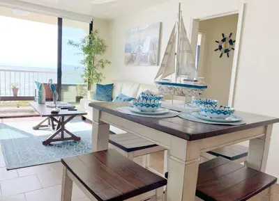a dining room with a table with a sailboat on it at Sunset Cliffs Oceanfront Oasis, San Diego - Stunning Views & Ocean Sounds in San Diego
