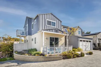 a large house with a gray and white at Large 4 Bedroom Close To Beach in Encinitas
