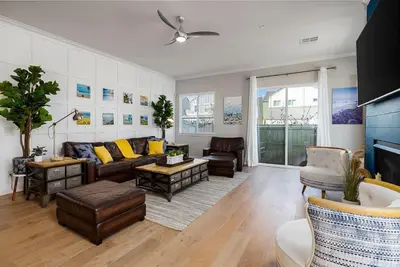 a living room with a couch and a table at Large 4 Bedroom Close To Beach in Encinitas
