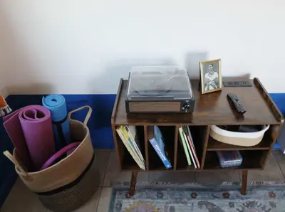 a table with a laptop on top of it at Colorful Casita Frida 1BD Retreat by Balboa Park in San Diego