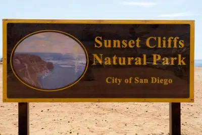 a sign for the sunset cliffs national park on the beach at Hilltop Villa Offering Uninterrupted Ocean Vistas in San Diego