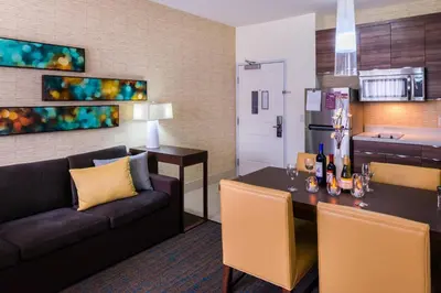 a living room with a couch and a table at Residence Inn by Marriott Temecula Murrieta in Murrieta