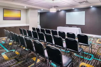 a conference room with chairs and a screen at Residence Inn by Marriott Temecula Murrieta in Murrieta