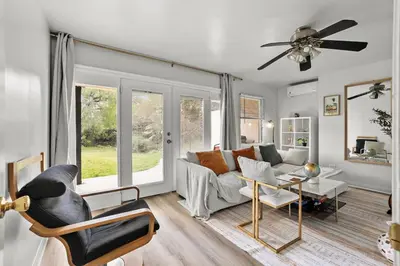 a living room with a couch and a table at Entire Private Home with 4 Bedrooms 3 Bathrooms, King Bed, Big Yard, Prime Area, Ranch Style, Available Now in La Mesa