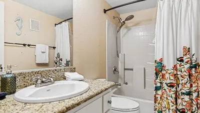 a bathroom with a sink and a toilet and a shower at Close to Beach w Patio Resort Amenities The Point at Corniche by AvantStay STR16-0458 in Dana Point