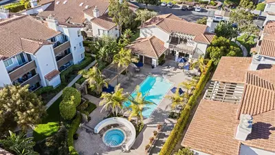 an aerial view of a villa with a swimming pool and houses at Close to Beach w Patio Resort Amenities The Point at Corniche by AvantStay STR16-0458 in Dana Point