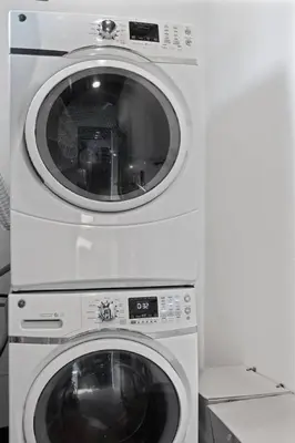 two washing machines stacked on top of each other at Secluded Dream Home with Hot Tub and Full Gym on 20 Acres in Palomar Mountain