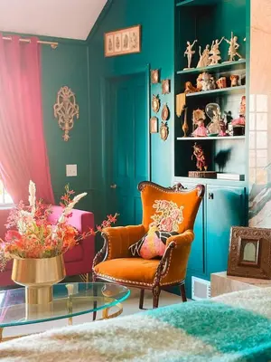 a living room with a chair and a glass table at Enchanted Estate With Animals Lightscapes and Whimsy in Bonsall