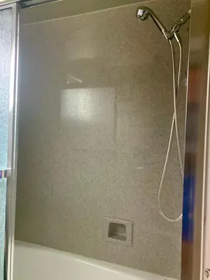a shower with a glass door in a bathroom at Room in Bay Park, San Diego in San Diego