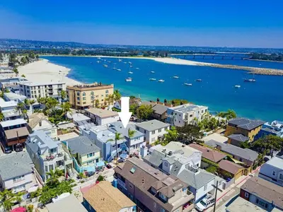 an aerial view of a city with boats in the water at Bali Beach in San Diego