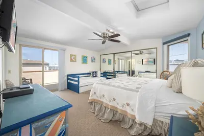 a bedroom with a bed and a large window at Luxurious Oceanfront Home with Incredible Views in Newport Beach