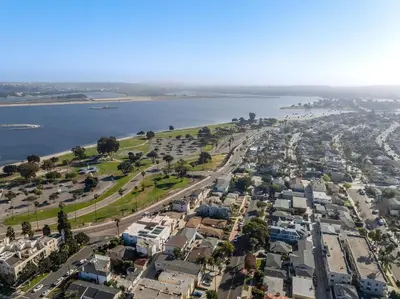 an aerial view of a city with a river and houses at Boho Beach Bungalow Walk to the Beach in San Diego