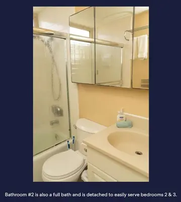a bathroom with a toilet and a shower and a sink at Ocean Front Beauty right above Best Beach in Mission Beach, San Diego! in San Diego