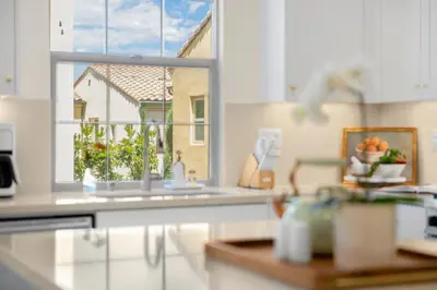 a kitchen with a window and a sink and a counter at Modern Elegant Designer Home in Irvine in Irvine