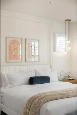 a white bedroom with a large white bed with white pillows at Modern Elegant Designer Home in Irvine in Irvine