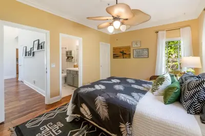 a bedroom with a bed and a ceiling fan at Buena Creek Refuge - Family Resort Destination - Secure and Private - in Vista