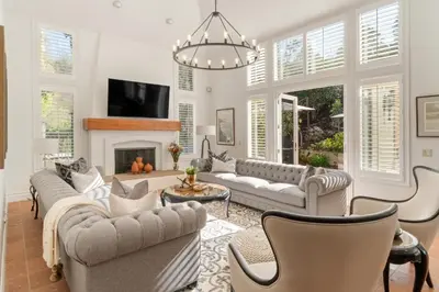 a living room with couches and a fireplace at Buena Creek Refuge - Family Resort Destination - Secure and Private - in Vista