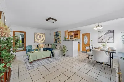 a living room with a couch and a table at Entire Private Home with 4 Bedrooms 2 Bathrooms, Garage & Gated Yard, Near San Diego Gaslamp, Beach, Available Now in National City
