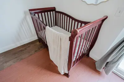 a wooden stair railing with a towel on it at Entire Private Home with 4 Bedrooms 2 Bathrooms, Garage & Gated Yard, Near San Diego Gaslamp, Beach, Available Now in National City