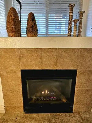 a fireplace with a fire in it in a room at Wine Country Reserves in Murrieta