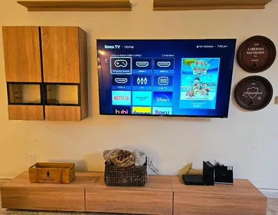 a tv on a wall with a video game on it at Wine Country Reserves in Murrieta