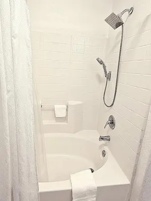 a white bathroom with a shower and a tub at Wine Country Reserves in Murrieta