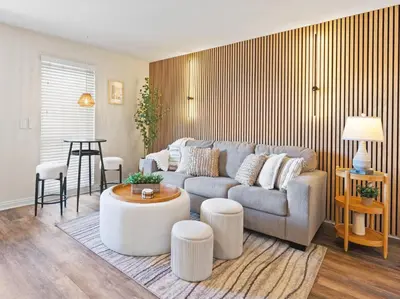 a living room with a couch and a table at 2 Bdrm Condo + Parking in Heart of Mission Beach! in San Diego