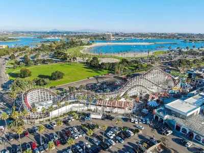 an aerial view of an amusement park with a roller coaster at 2 Bdrm Condo + Parking in Heart of Mission Beach! in San Diego