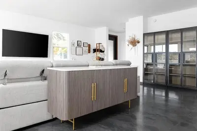 a living room with a couch and a tv at Large Home With Sauna in Vista