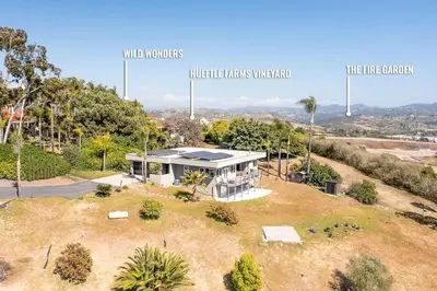an aerial view of a house in a field at Large Home With Sauna in Vista