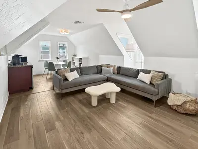 a living room with a couch and a table at F-72 Terramar Cliffs in Carlsbad