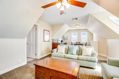 a living room with a couch and a ceiling fan at F-75 Terramar Cliffs in Carlsbad