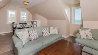 a living room with a couch and a coffee table at F-75 Terramar Cliffs in Carlsbad