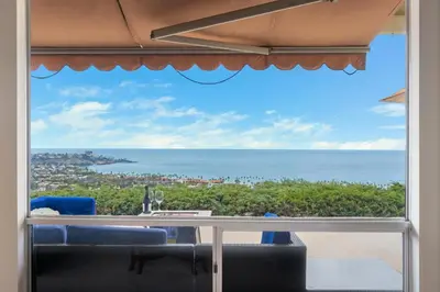 a view of the ocean from the balcony of a house at La Jolla Shores Views in San Diego