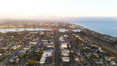 an aerial view of a city next to the ocean at Walk to the Beach Private Backyard and Fire Pit in Oceanside