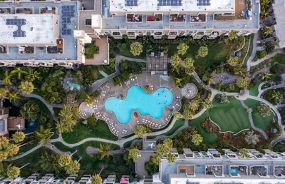 an overhead view of a resort with a pool at Panoramic Water Views - Steps to the Beach - F-2 in Oceanside