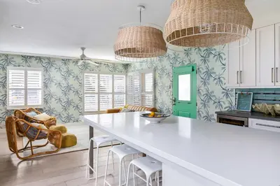 a kitchen with a white table and chairs at Inviting 3BR Near Mission Beach in San Diego