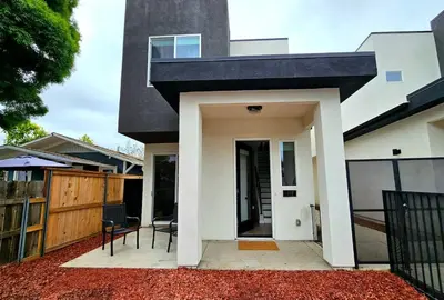 a modern house with a black roof at Heights Golden Luxe Retreat in San Diego