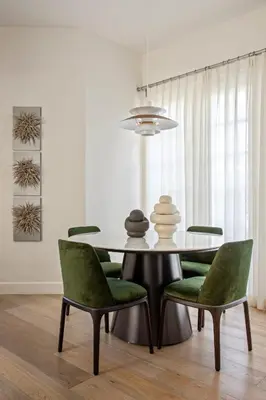a dining room with a table and green chairs at 3BR La Jolla Village Walk to Beach in San Diego