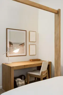 a desk with a lamp and a chair in a room at Carmel Valley 2BR with Amenities in San Diego